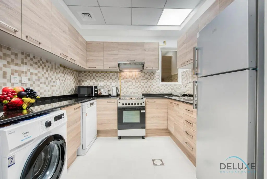 Vivid 2BR at Canal Residences West Dubai Sports City by Deluxe Holiday Homes