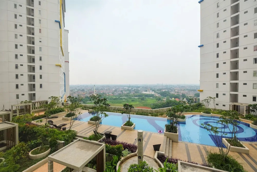 Spacious 2 Bedroom at Bassura City Apartment By Travelio