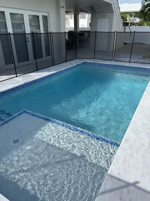 Beautiful Canal Front Home With Above Ground Pool, Dock And Fish Cleaning Station 4 Bedroom Home by RedAwning