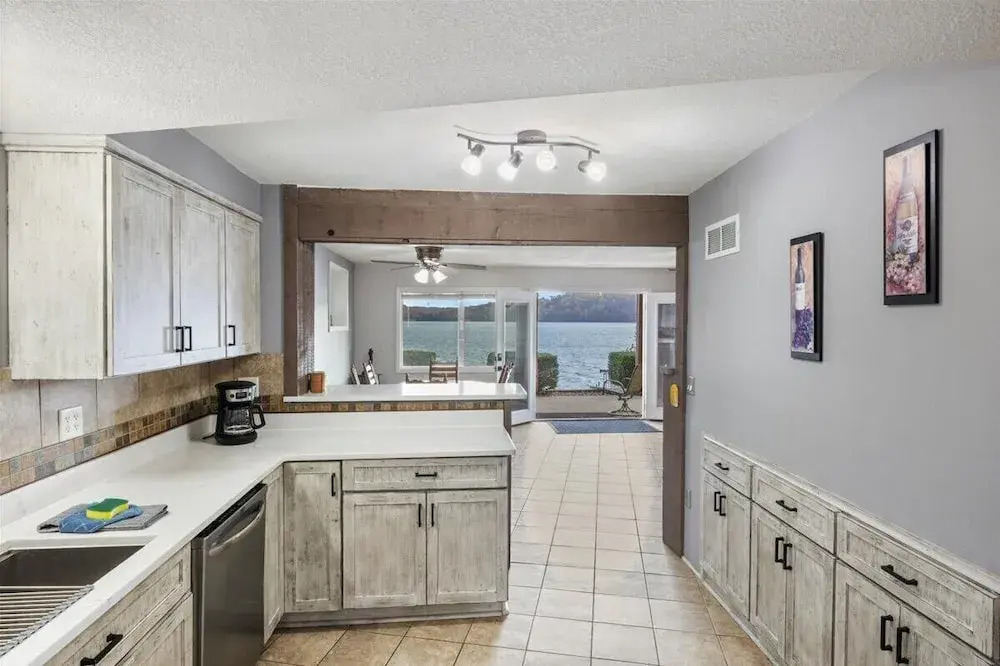 Newly Updated Interior, Sunroom w/ Hot Tub, Deck, Deep Water Dock, Boat & PWC Slips