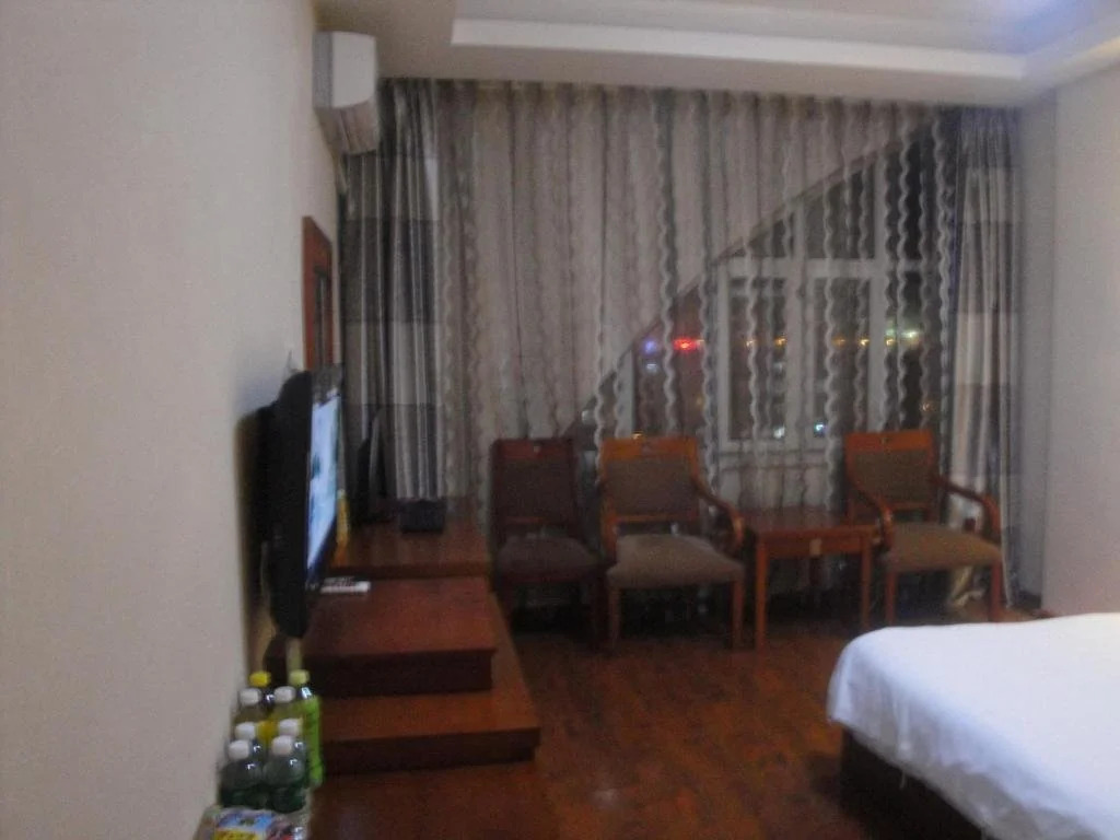 Mudanjiang Wan Zai Business Hotel
