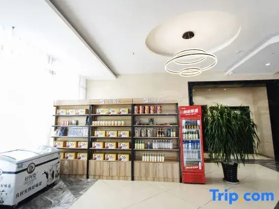 Shell Hotel (Fei County Dongfang Shopping Plaza Ginkgo Jin Street)