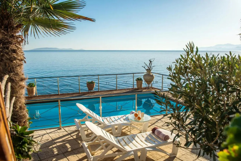 Exclusive Seaside Retreat with Shared Pool & Private Beach Access