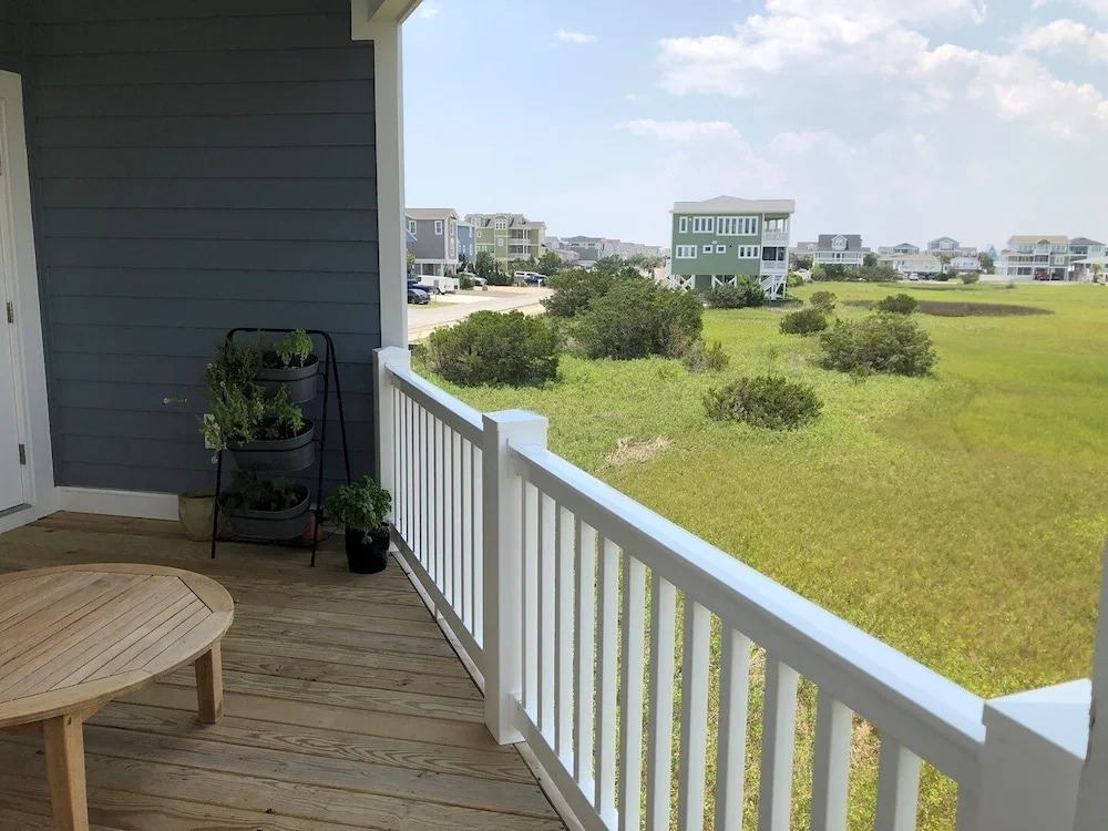 Sun-kissed Mermaid / 846 Ocean Blvd West 2 Bedroom Home by RedAwning