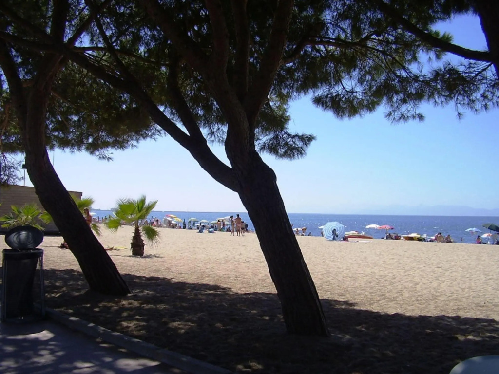 Holiday home on the Torregrande seafront, 30 meters from the seashore-Casa delle Palme