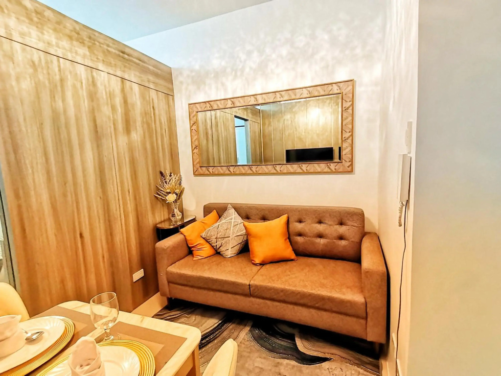 Stylish 1 Bedroom Condo Unit with Perfect Pool View Balcony at Fame Residences