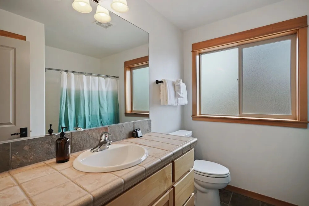 Professionally Decorated Shevlin Home features Private Hot Tub by RedAwning