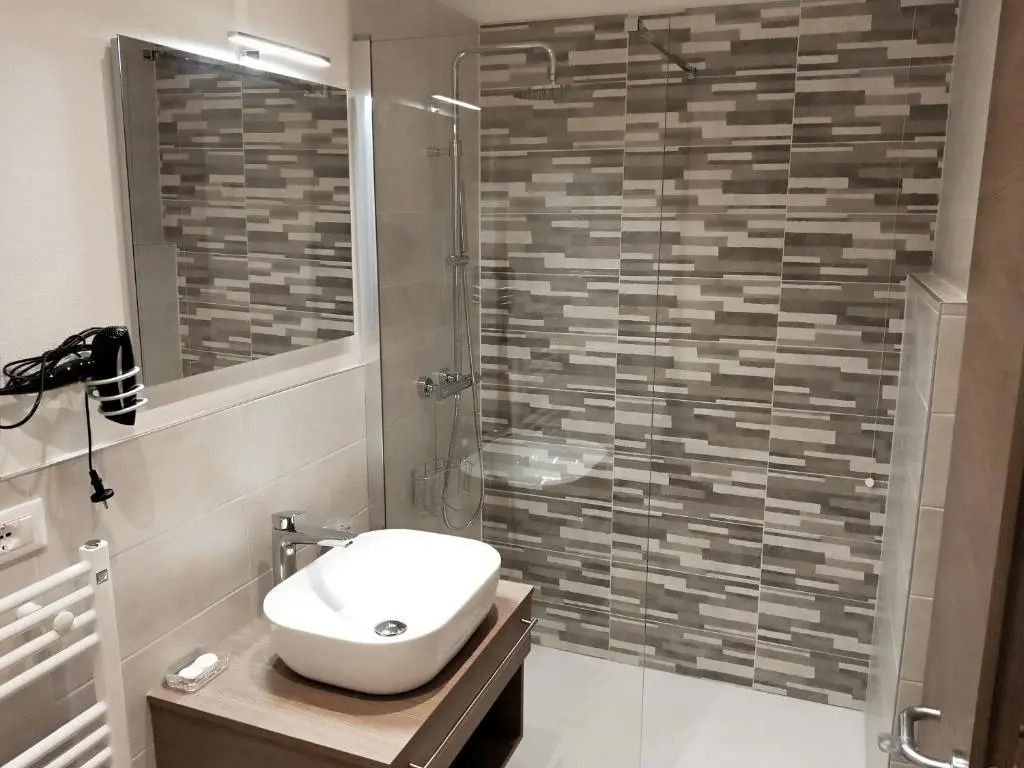 Via Poma Apartments&Rooms