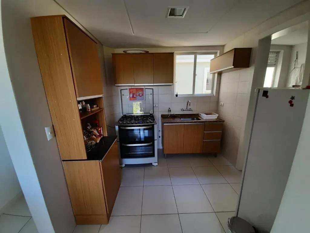 Quarto com cama de casal ao lado da Ópera de Arame