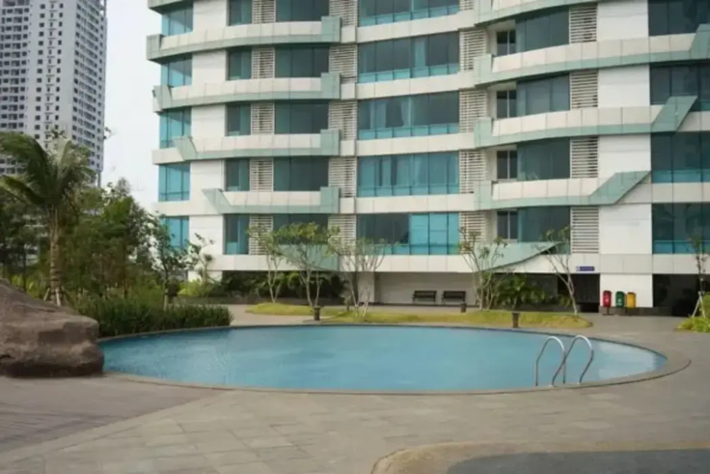 Enjoy Living Studio Room at High Floor Grand Kamala Lagoon Apartment By Travelio