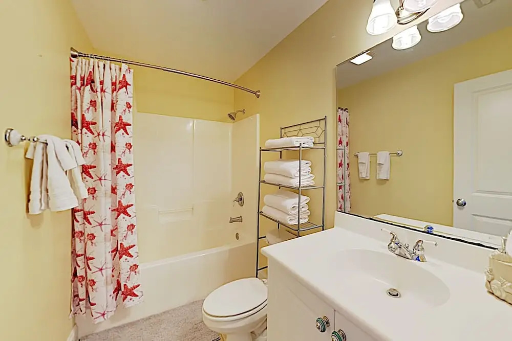 New Listing! Coastal Gem W/ Balconies, Near Beach 4 Bedroom Duplex