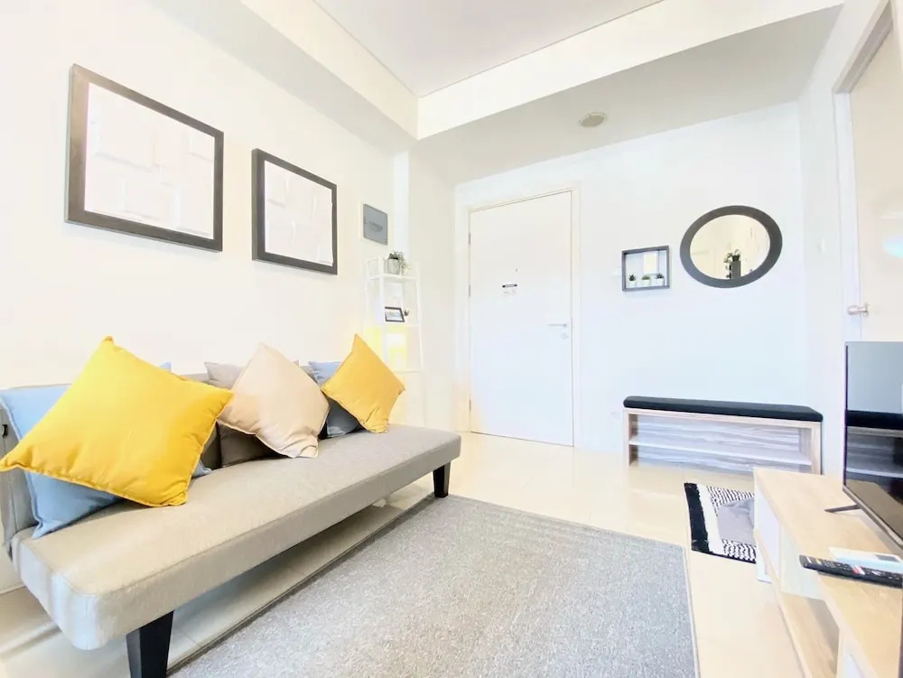 Bright and Private 2BR Apartment at Parahyangan Residence near Nara Park By Travelio