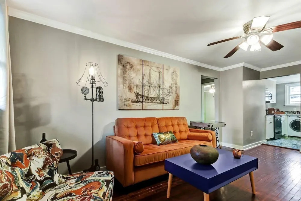 Vibrant, Colorful Condo Building With Backyard Firepit and Games