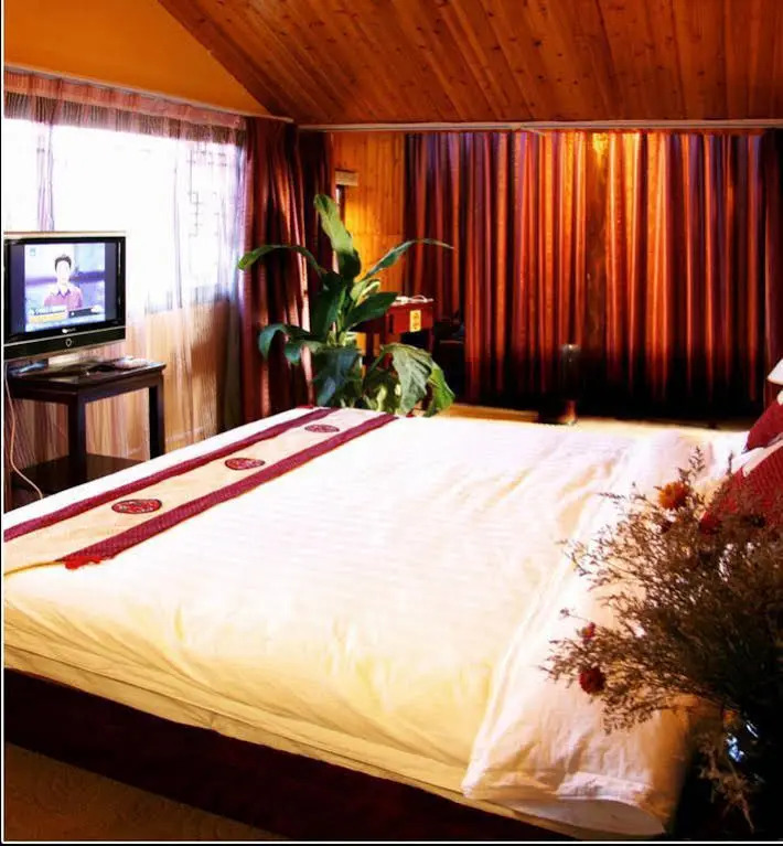 Lijiang Yunmuwan provides breakfast and afternoon tea, offers free airport shuttle service, The hotel provides a platform for visiting the ancient city and Yulong snow