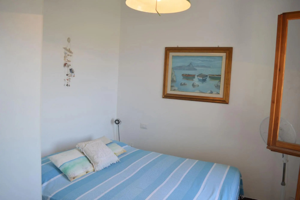 Holiday home on the Torregrande seafront, 30 meters from the seashore-Casa delle Palme