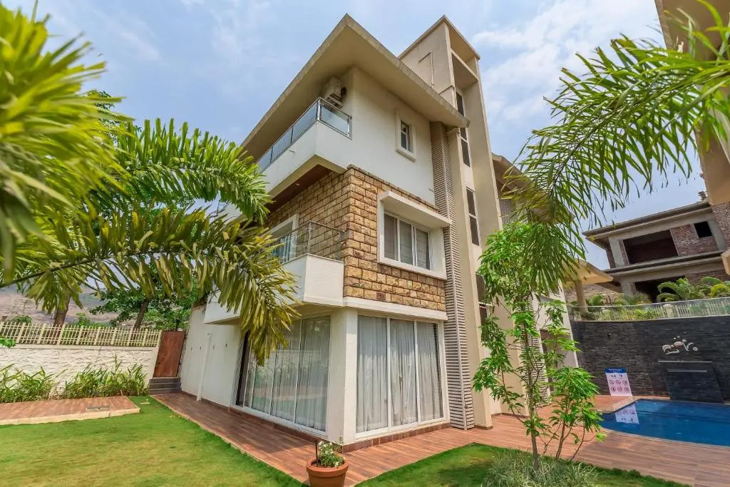 SaffronStays Juniper, Lonavala - Pet-friendly villa with pool, lawn, gym & games