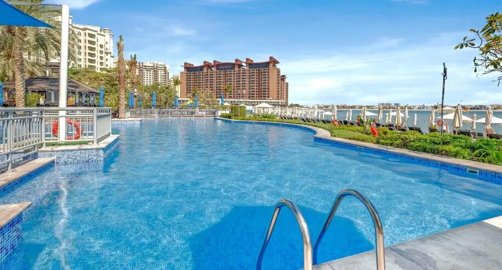 Chic Beachside 3BR Living at the Palm
