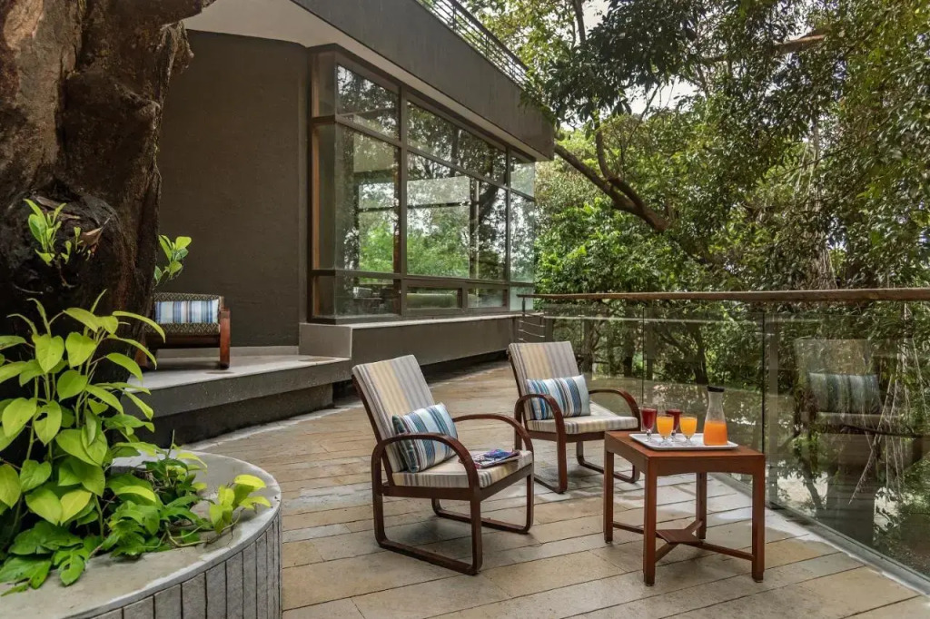 SaffronStays Odeon - 4BR heritage art deco villa with cantilever pool, verandahs & forested lawns
