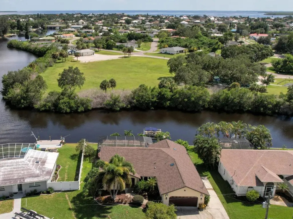 Waterfront House with a Boat and Heated Pool