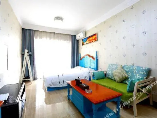 Lvxing Theme Apartment (Zhuhai Chengfeng Shuijingzuo)