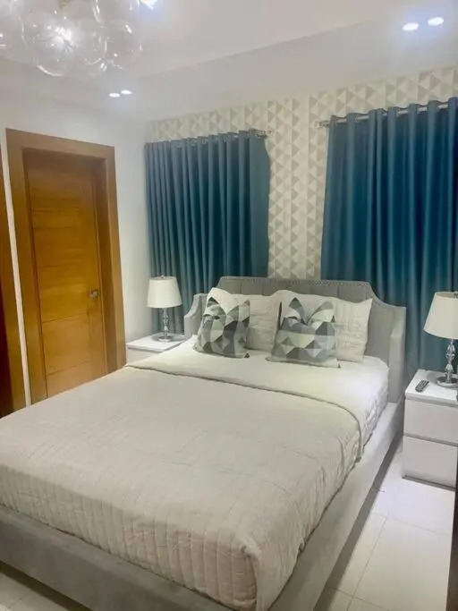 1BR modern centric apartment Pool, gym, rooftop Santo Domingo