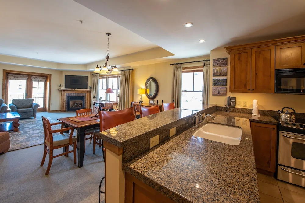 Two Bedroom Condo with Balcony over Mountaineer Square - Just Steps from the Slopes! 2 Condo - No Cleaning Fee! by RedAwning