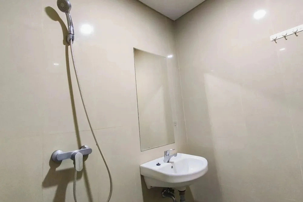 Comfy Modern Look Studio Room At Apartment Grand Dharmahusada Lagoon