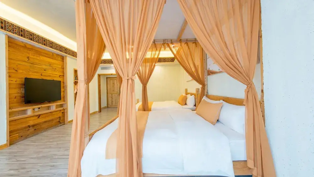 Floral Hotel Fenghuang Huercaowu