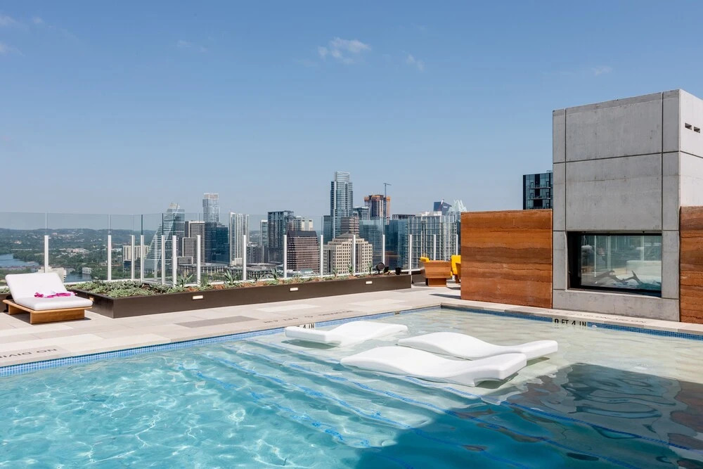 20th floor condo with pool on Rainey St by Locale
