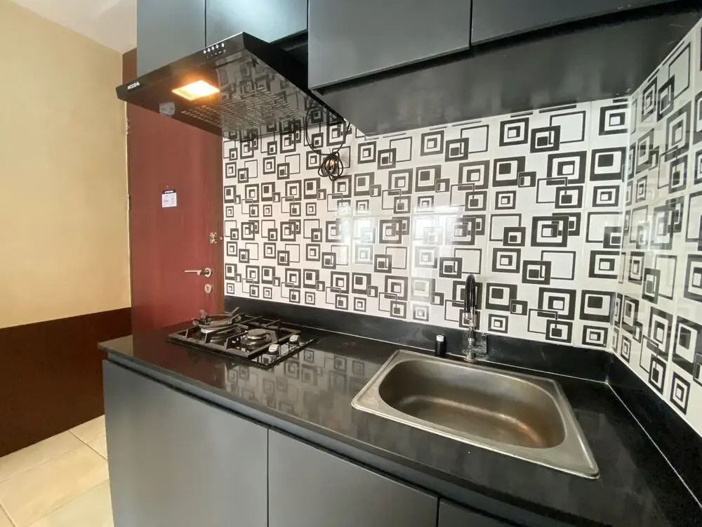 Comfy & Well Appointed 2BR at Tamansari Panoramic Apartment