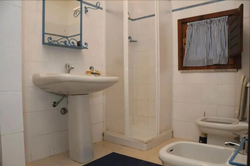 Spiaggia Bianca Pedra Rosa - Your House in Sardinia
