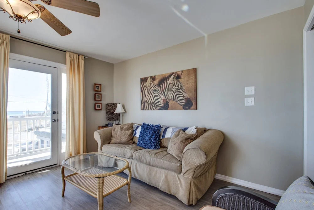 Summer Breeze 201 1 Bedroom Condo by RedAwning