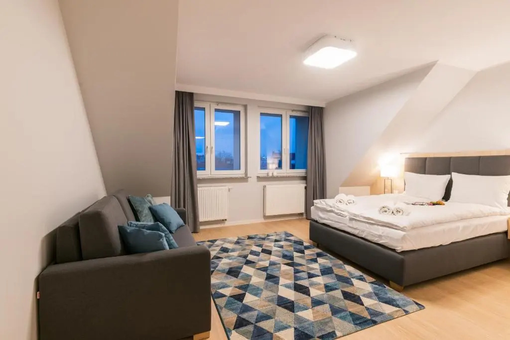 Q17 Apartments Rynek