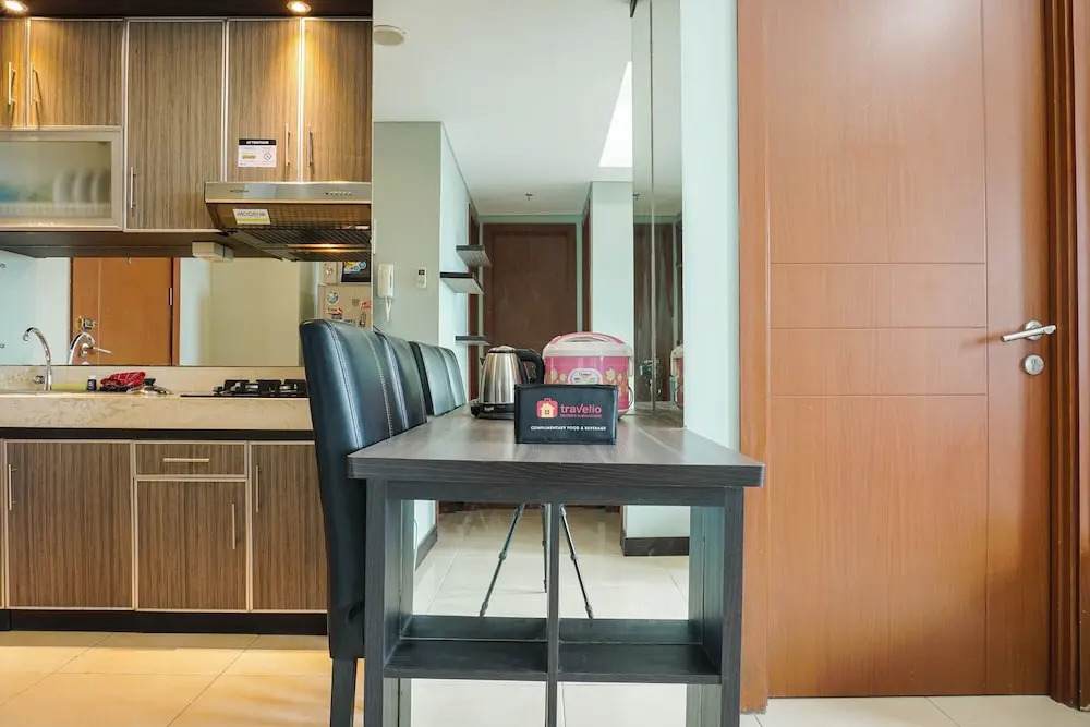 Best Location and Cozy 2BR The H Residence Apartment By Travelio