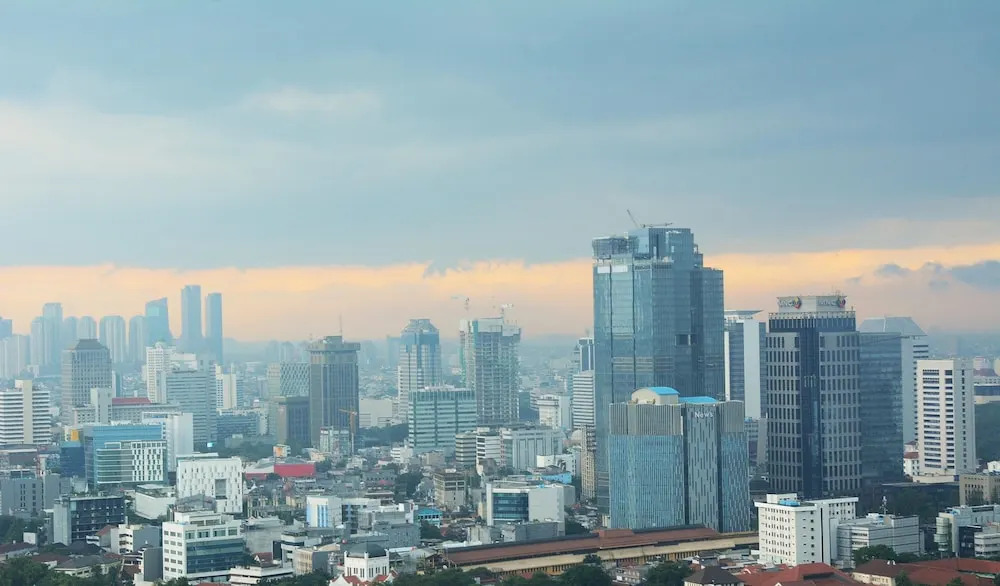 Comfy Studio Room with City View at Menteng Park Apartment By Travelio