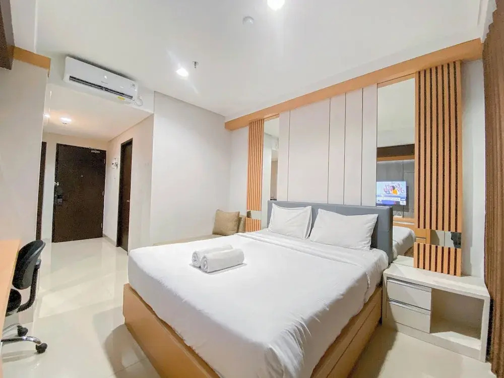 Nice Studio at Patraland Amarta Apartment By Travelio