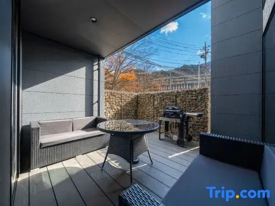 River view house with BBQ & private sauna, wood stove — designer villa with stone terrace & fire