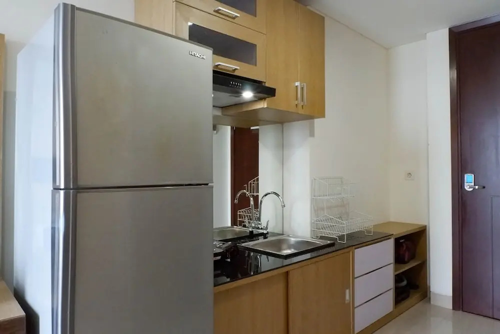 Serene Exclusive Modern Studio Apartment at Grand Sungkono Lagoon By Travelio