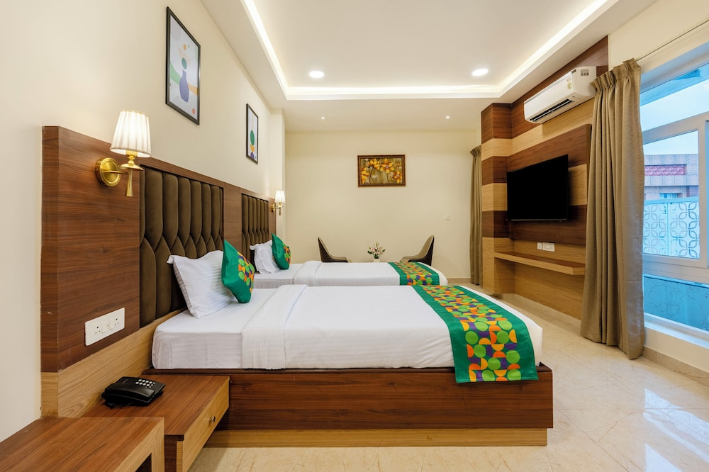 Treebo Premium Pine Tree Courtyard