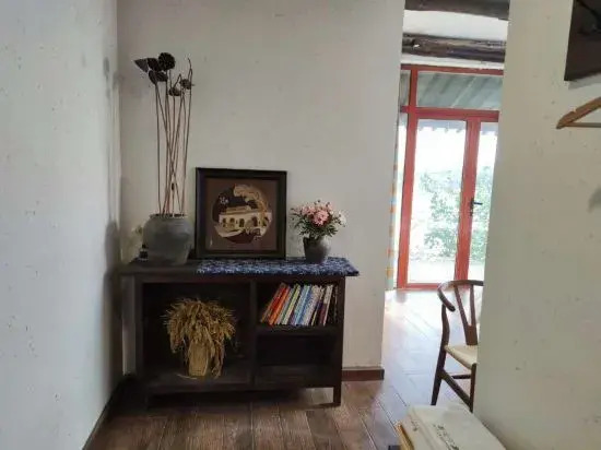 Mengzhou Hejia Courtyard Hotel
