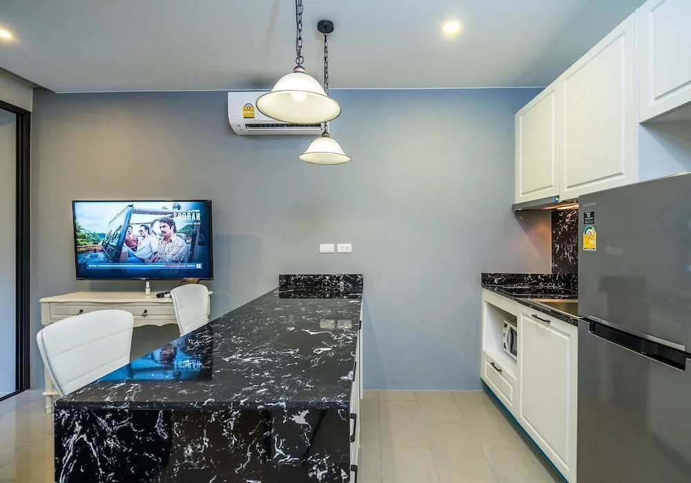 Apartment at Palmyrah Surin by Lofty