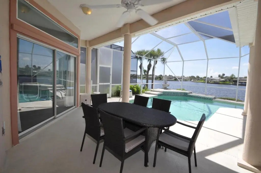 Sunset Bay Beautiful Pool Home - Bring Your Boat or Jet Ski - Canal with Dock- Sleeps 10 - 4 BD