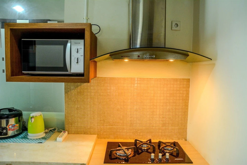 Cozy Pool View Kemang Village Residence Apartment with Direct Access To Mall