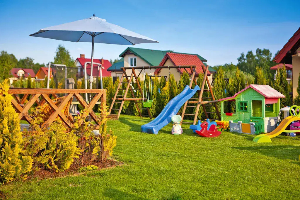 Half of holiday home, terrace, playground