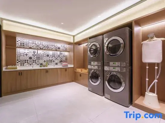 Magnolia Business Hotel ( Dalian Jinzhou Hengda Garden）