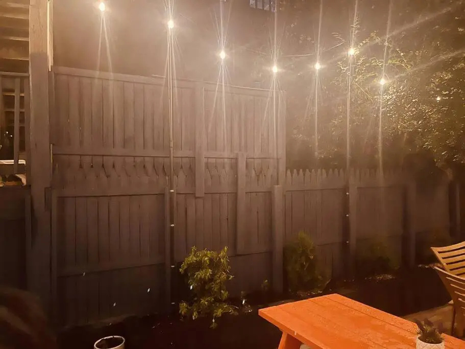 1850s historic Row House 7min train to NYC with private backyard