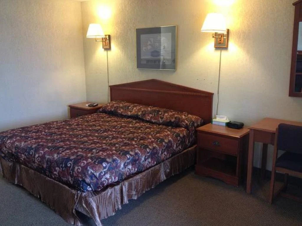 Woodridge Inn and Suites