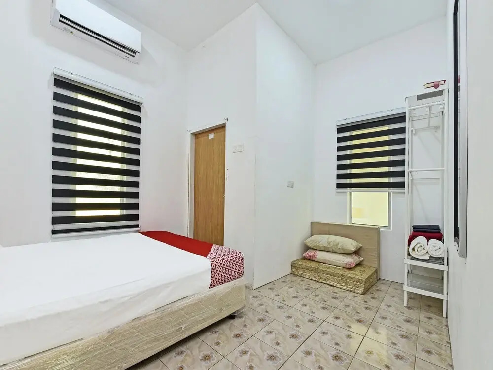 Capital O 90520 Fikri Wetland Guesthouse