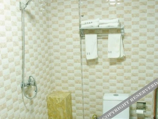 Junyi Chain Hotel (Zaozhuang Tai'erzhuang District Old City West Gate)