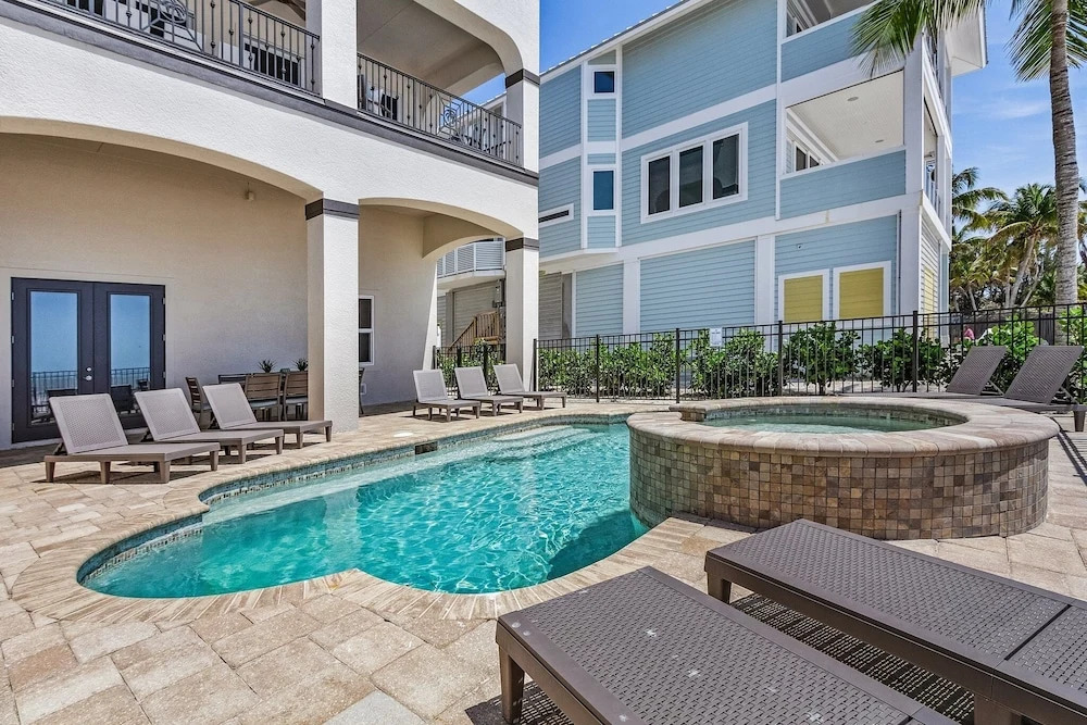 Curious Tides - 3132/3134 Estero Blvd. 10 Bedroom Townhouse by RedAwning